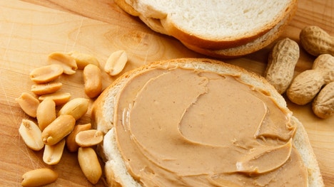 The eastern New Mexico peanut butter plant shuttered eight months ago after a salmonella outbreak is back in production, and company officials say their coveted natural and organic butters could be back on store shelves within a month.